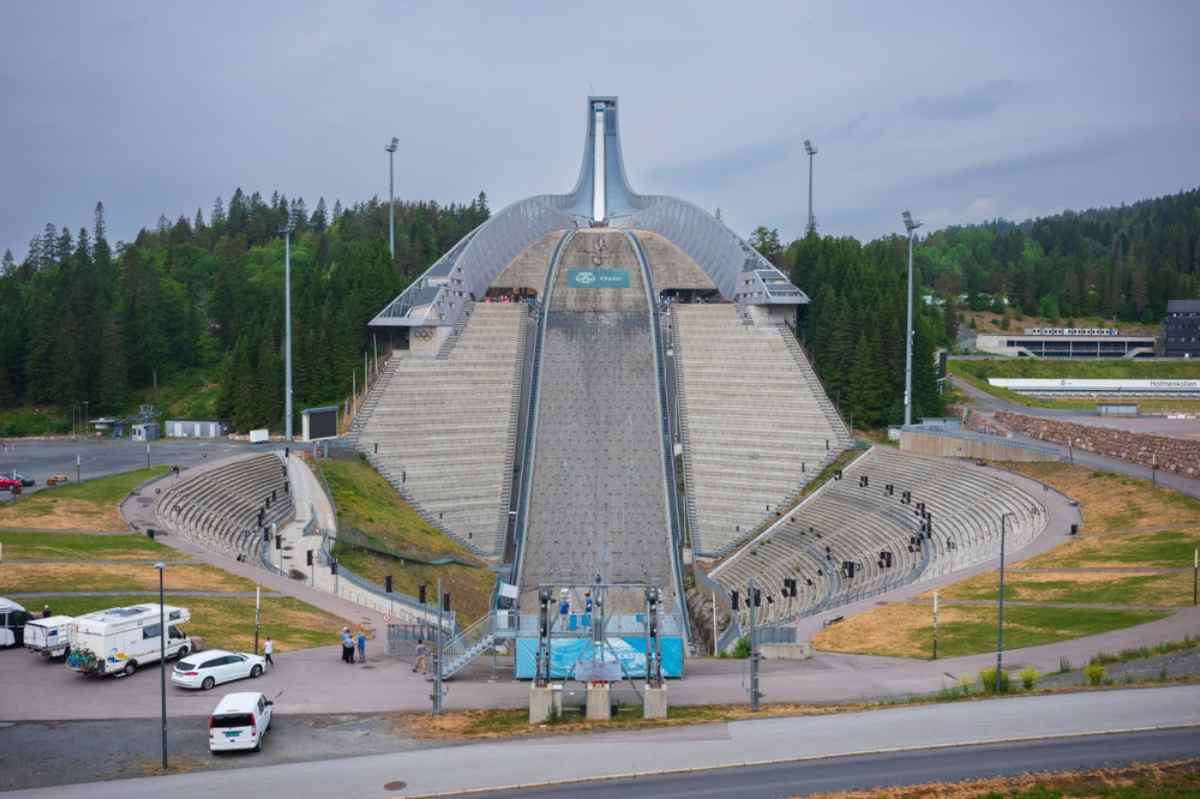 Holmenkollen Ski Jump in Oslo, Norway, seen from the base on a cloudy day.
