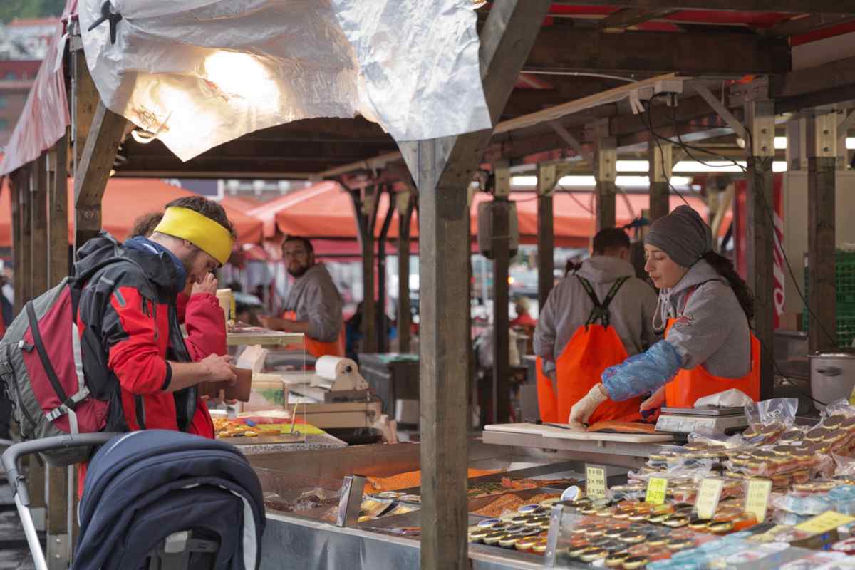 Vendors selling fresh seafood at Bergen Fish Market.