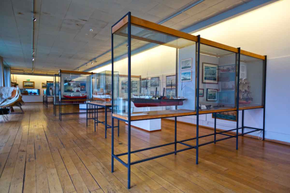 Exhibition hall at Bergen Maritime Museum with ship models on display.