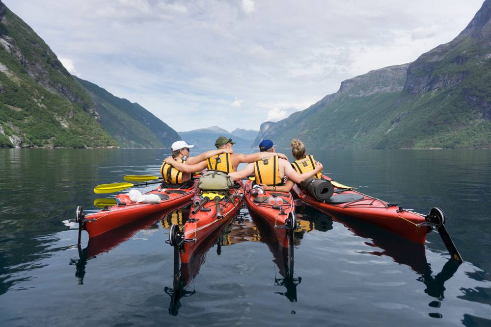 Group of persons kayaking in Norway